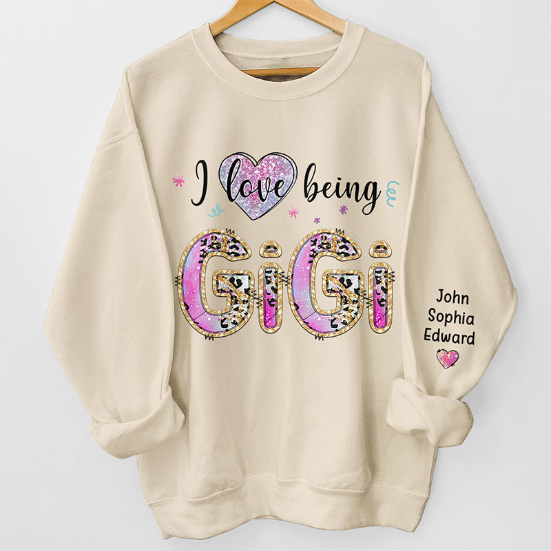 Je suis Gigi - Sweat-shirt unisexe personnalisé avec motif sur la manche - Cadeau de Noël pour maman, grand-mère