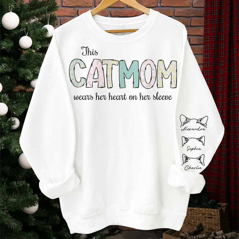 Son cœur sur sa manche - Sweat-shirt unisexe personnalisé avec motif chat sur la manche - Cadeau de Noël pour les propriétaires d'animaux et les amoureux des animaux