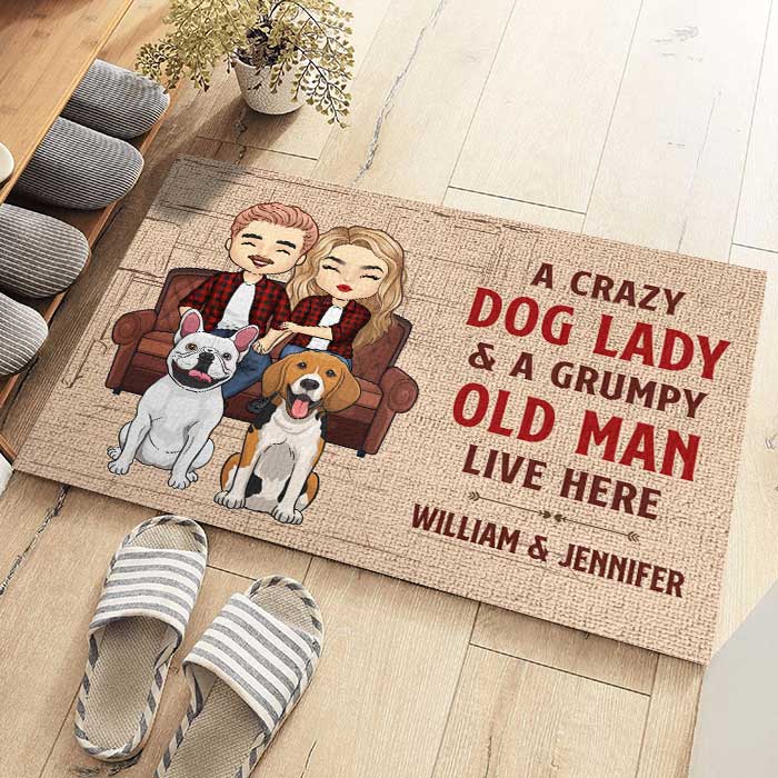 A Crazy Dog Lady And Her Grumpy Old Man Live Here - Personalized Decorative Mat.